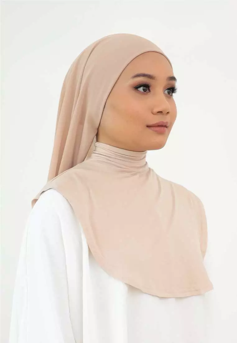 ELZARITHA. BEIGE HALF TURTLE INNER NECK