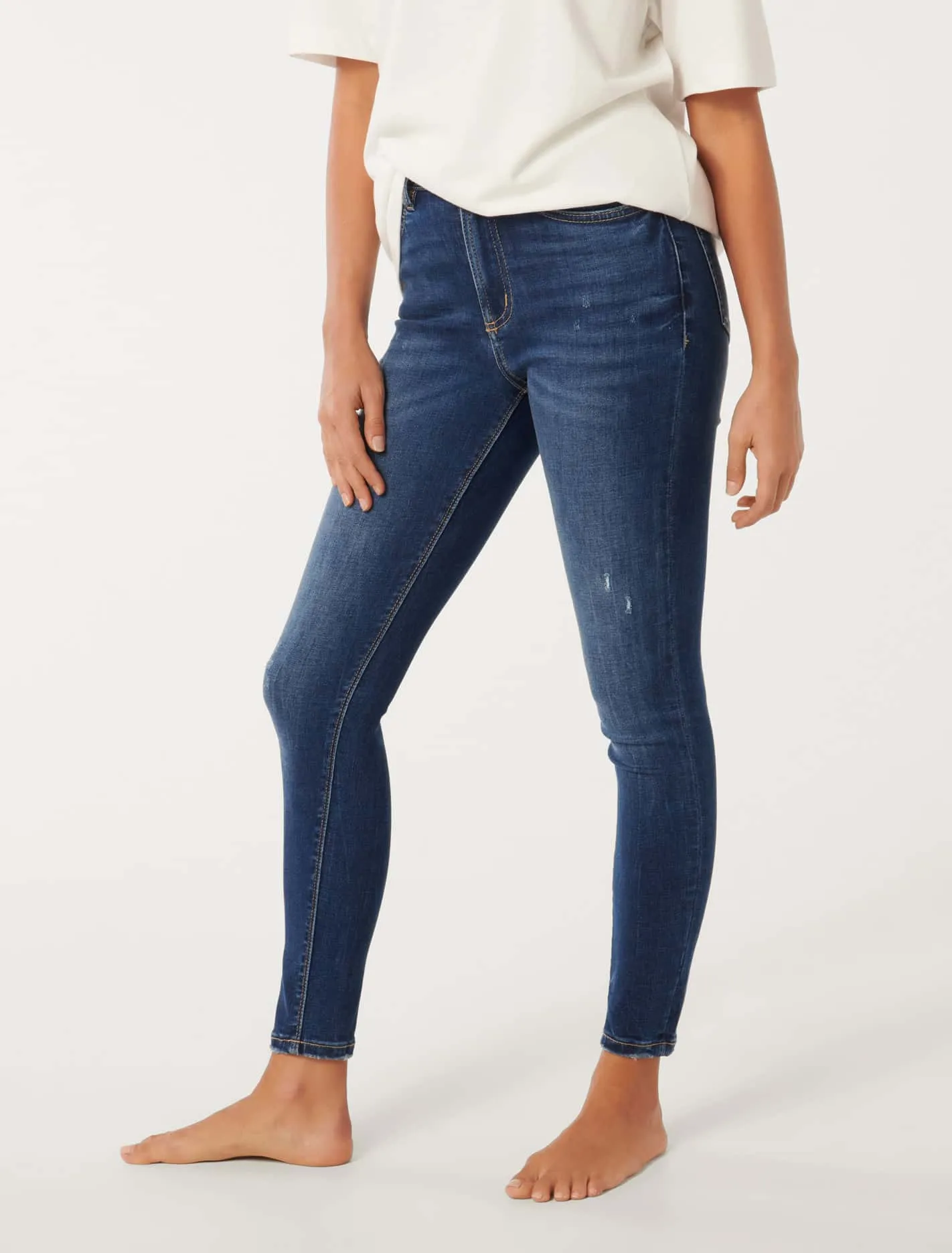 Nala Mid-Rise Skinny Jeans